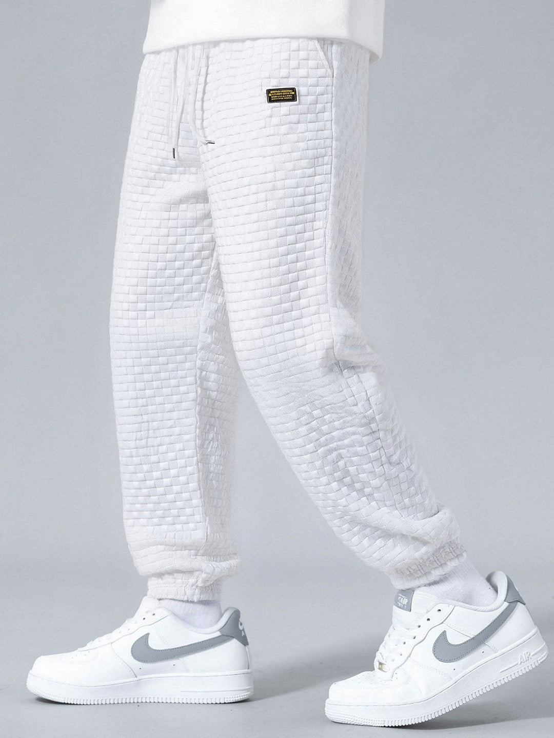 Geovari | Checkerboard Sleeveless Zip-Up Hoodie and Jacquard Jogger Trousers