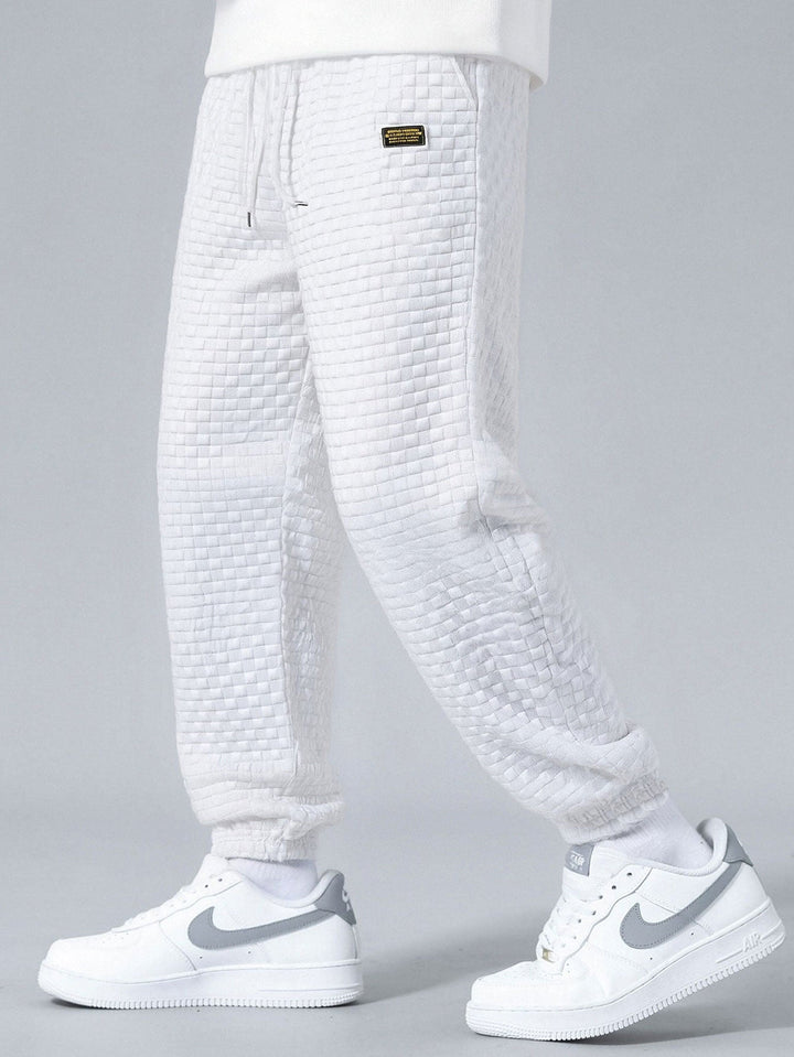 Geovari | Checkerboard Sleeveless Zip-Up Hoodie and Jacquard Jogger Trousers